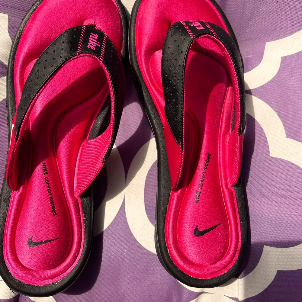 Nike padded flip flops… worn twice